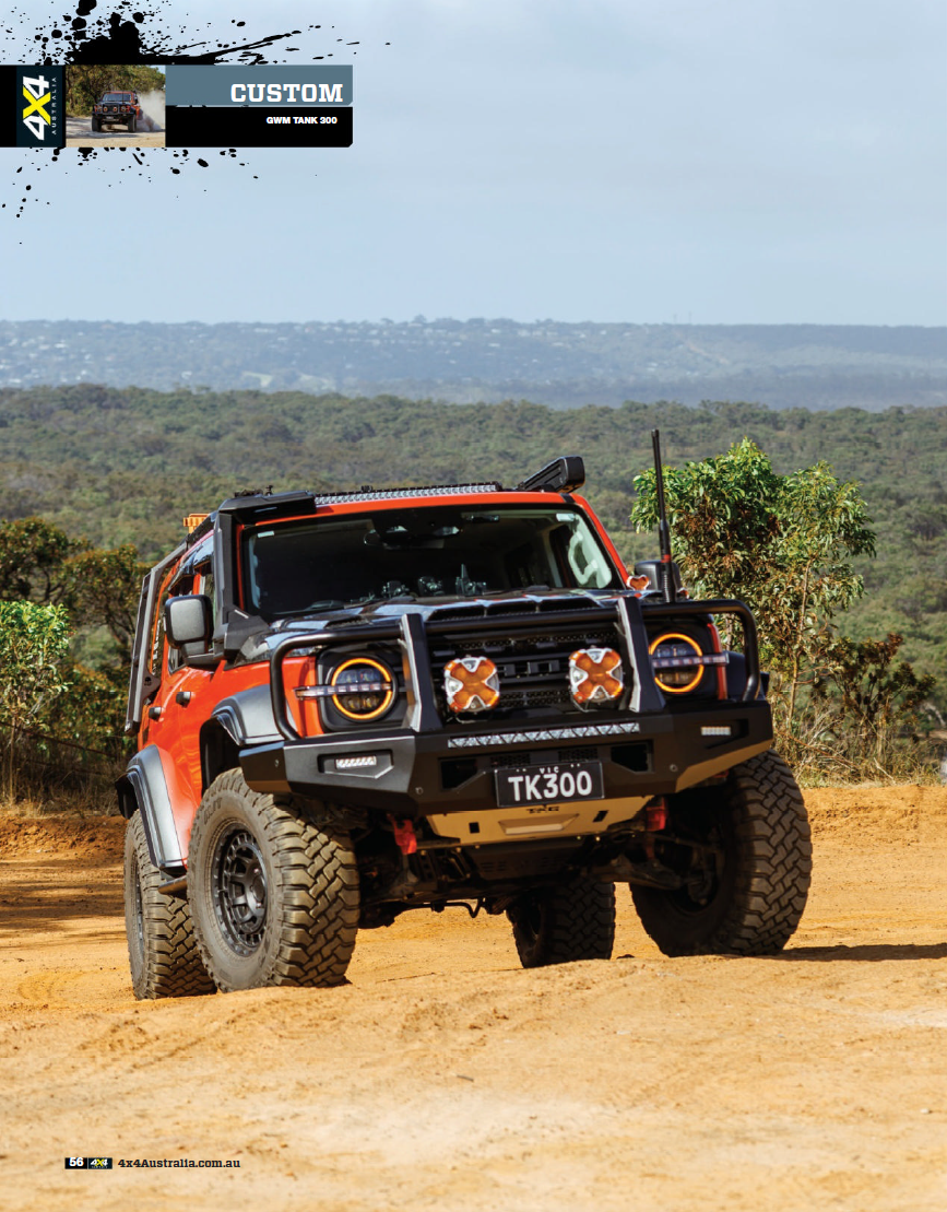 Off-road vehicle tank300 with TKG mk3 bullbar on a dirt road with a scenic background