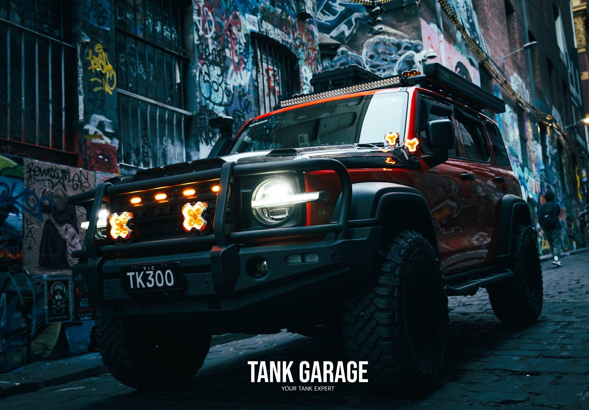 Orange off-road Tank 300 with HALO Series 3" LED Pods Light Head Light Spot Light